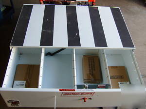 New weatherguard 303-3 pack rat 4-compartment 12X40X24 
