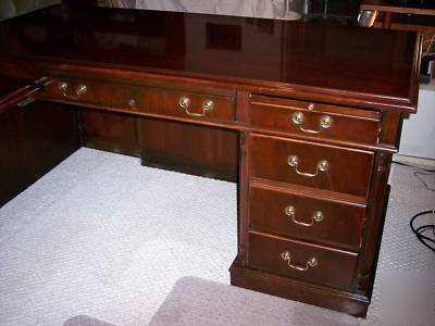 Hardwood cherry finished l-shaped business desk