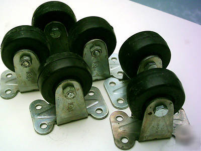 New set of (4) 2â€ hard rubber castors / wheels -- 