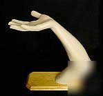 Male mannequin arm and hand on base for display