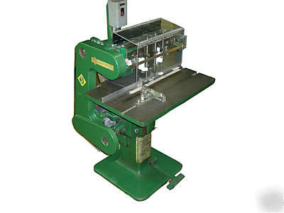 Nygren-dahly multi head paper drill 3-hole punch