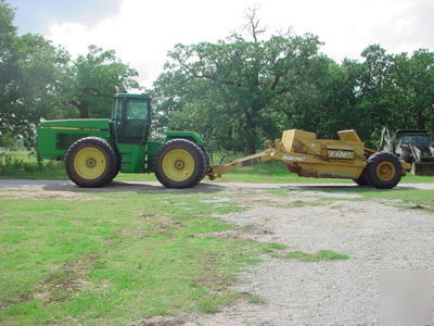 John deere 8760 tractor and ashland scraper