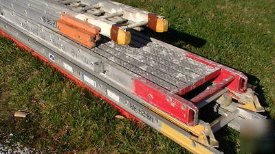 Large extension ladders and walk board
