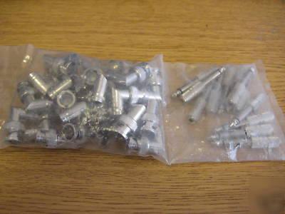Bag of l shaped bnc connectors with 12 1/8 to 1/4 jacks