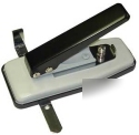 Stapler style slot punch with adjustable side guide