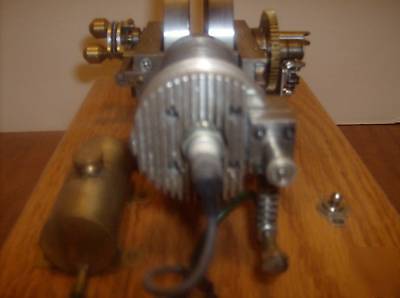 Six-cycle oddball hit & miss model engine by p duclos