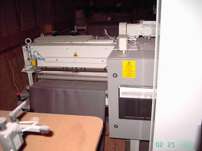 High speed magnetic laminator/die cutter