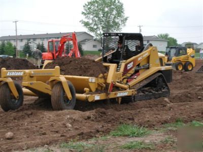Skid steer scraper attachment, ashland ground hog 2500