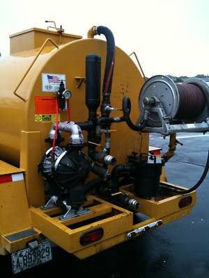 Asphalt sealer and hot box