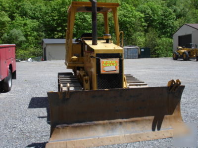 Caterpillar D4CXL series 3 dozer, 6 way blade