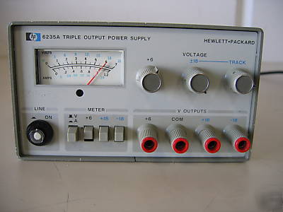 Agilent / hp 6235A triple output dc power supply 0 -18V