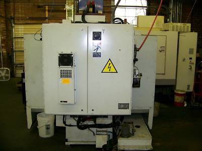 Titan vmc, fanuc om, 20 tools, 16