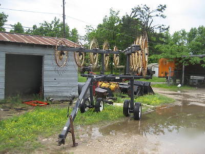 Good used 10 wheel hay rake on cart