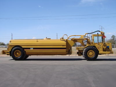 1988 caterpillar 613C mega 5000 gallon waterpull