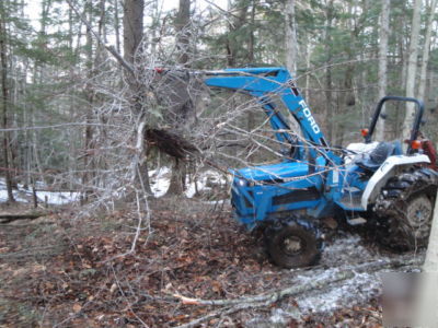 Tractor thumb / bucket grapple implement