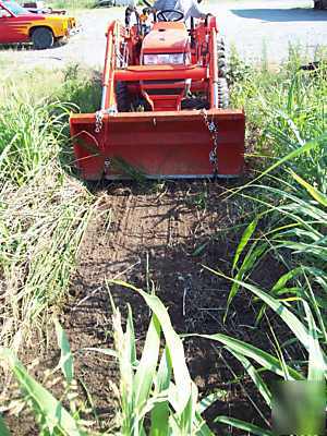 Skidsteer loader bucket teeth tooth bar toothbar debris