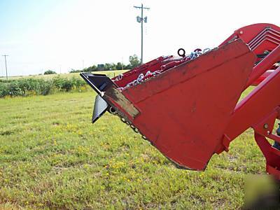 Skidsteer loader bucket teeth tooth bar toothbar debris