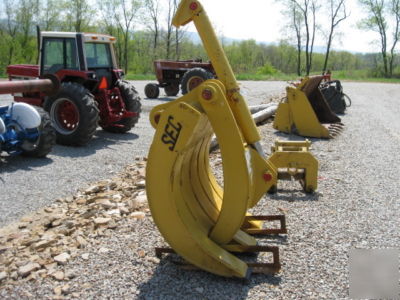 Sec grapple bucket with hydraulic thumb