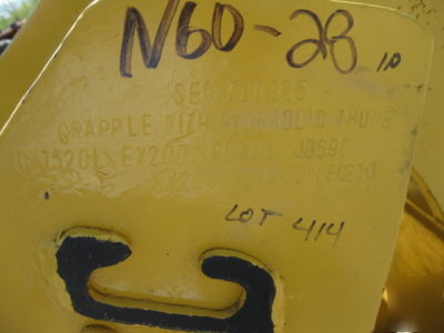 Sec grapple bucket with hydraulic thumb