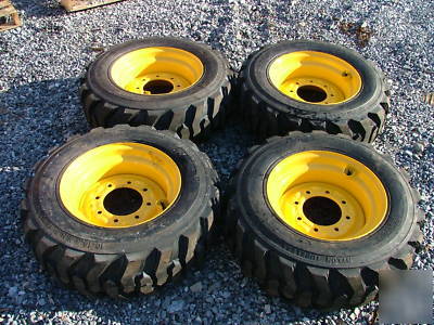 New 4 skid steer tires and rims - 10X16.5 - 10 ply - 