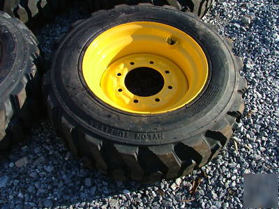 New 4 skid steer tires and rims - 10X16.5 - 10 ply - 