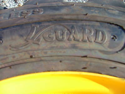 New 4 skid steer tires and rims - 10X16.5 - 10 ply - 