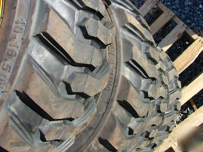 New 4 skid steer tires and rims - 10X16.5 - 10 ply - 