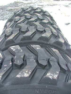 New 4 skid steer tires and rims - 10X16.5 - 10 ply - 