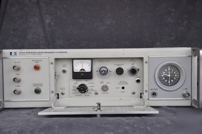 Hp 5065A rubidium freq. standard w/ patek-philipp clock