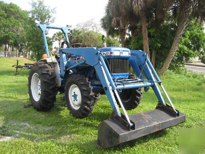  ford 28 hp 4X4 with loader $6800 