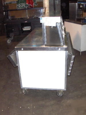 Serving table with stainless steel top
