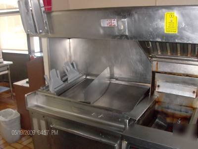 Deep fryer,self filtering timers,fridge base, and hood 