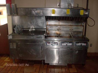 Deep fryer,self filtering timers,fridge base, and hood 