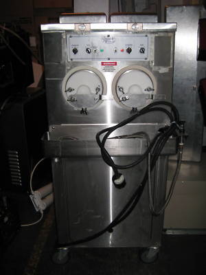 Frozen custard machine and 4 compartment dipping cabine