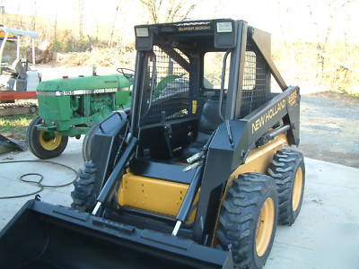 New holland LX665 turbo skid steer loader, excellent