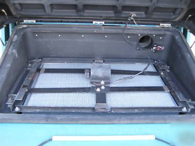 Tennant rider sweeper, hydraulic dump hopper, lp gas 