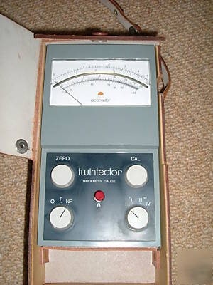 Elcometer twintector thickness gauge in leather case.