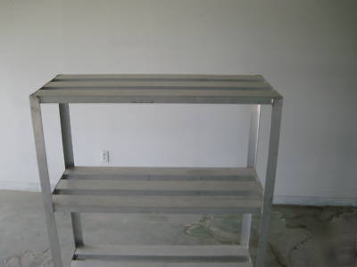 Used 3 shelf aluminum storage rack 48