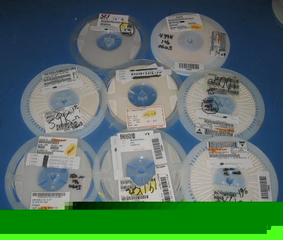 Lot of 8 reels of unknown quantity resistors