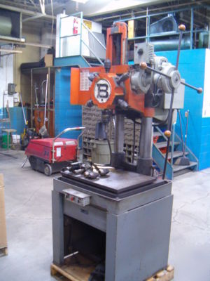 Burgmaster drilling machine with power feed