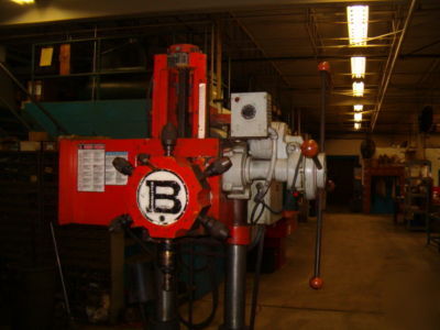 Burgmaster drilling machine with power feed