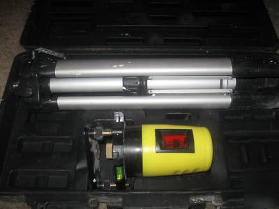 Laser level with vertical and horizontal cross hairs.