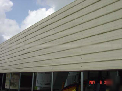 Metal carport storage building 35 ft wide 50 long 10 hi