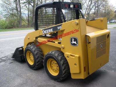 New /unused john deere 315 skidloader, no 