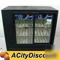 Used true manufacturing merchandiser cooler w/ 6 racks