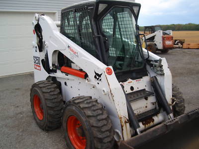 2007 bobcat S250 cab, heat, air, 2 speed, 635 hrs