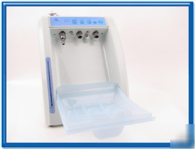 Automatic dental handpiece lubrication system & cleaner