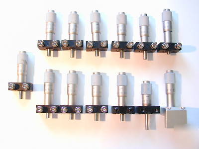 Lot of (13): melles griot, linear stage, micrometers.