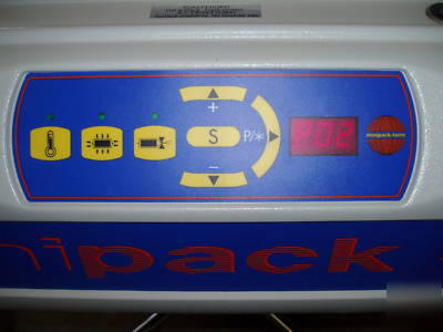 Minipack galaxy office heat tunnel shrink wrap machine