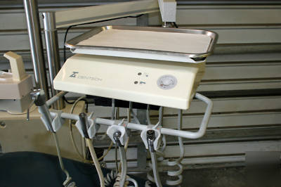 Dental chair with light, del. system & cuspidor